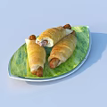 Delicious Stuffed Croissant Rolls on Green Leaf Shaped Plate with Savory Filling