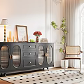 Black Sideboard With Glass Doors And Gold Handles In Elegant Interior With Decorative Items