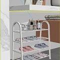 Multi Tiered White Shoe Rack Organizer with Slippers and Toiletries in Bathroom