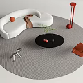 White Curved Sofa And Black Round Coffee Table Set With Gray Round Rug Green Plant