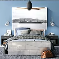 Double Bed In Cozy Bedroom With Upholstered Headboard Blue Plaid Bedding And Black Nightstands