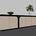 Modern TV Stand With Beige And Black Design Featuring Fruit Basket And Green Plant