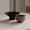 Elegant Ceramic Vessels Black Bowl and Gray Cup with Minimalist Design on Light Tabletop