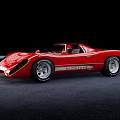 Vintage Red Sports Car Features Sleek Body 4200 Number And Silver Wheels On Dark Floor