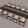Wooden Table and Chair Set with Blue Table Runner and Light Colored Cushions