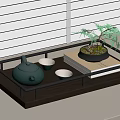 Elegant Green Tea Set with Teapot Cups on Tray and Small Plant near Window Blinds