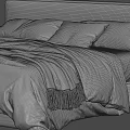 Cozy Bedroom Interior With Neutral Tones Bed Pillows Blanket And Black Side Table
