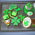 Clover Shaped Green Cookies And Cup Decorations On Festive Metal Tray