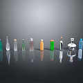 Household Items Different Colors And Shapes Bottles Arranged On Black Background With Reflections