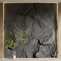 Gray Rock Texture Background Wall With Gold Frame And Green Plant In White Vase