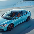 Sporty Blue Sedan With Sleek Design Driving On Open Highway Brown Leather Seats