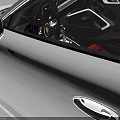 White Porsche Two Door Sports Car With Black Wheels And Red Interior