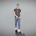 Man Standing Against Gray Background Wearing Dark Patterned T-shirt Blue Jeans White Sneakers with Reflection