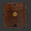 Vintage Electronic Device With Wooden Case And Metal Components Featuring Circular Holes And Knob