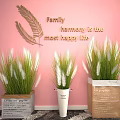 White Fluffy Grass Plants in Grey White and Brown Planters Against Pink Wall with Golden Leaf Art