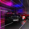 Black and Red Mercedes Benz Cars on Display with Neon Lights Background