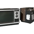 Vintage Televisions With Silver Frame Black Screen And Wooden Case Design