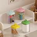 Transparent Storage Jars With Colorful Lids Holding Lipsticks Beauty Sponges And Tissues On White Shelf