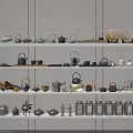Assorted Tea Sets Displayed on White Shelves with Teapots Teacups and Decorative Items 3d model