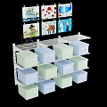 Storage Cabinet Shelf with Multiple Light Blue and Green Drawers and Decorative Pictures on Top