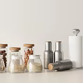 Modern Spice Bottles with Glass Storage Jars Wooden Lids and Silver Metal Containers on Light Countertop