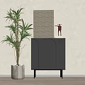 Black Entryway Cabinet Sideboard with Arched Doors Decorative Sculpture and Green Plant in Light Wall Interior