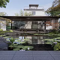 Tranquil Courtyard Garden With Lush Trees Pond Rocks Green Lawn And Metal Chairs
