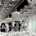Elegant Ballroom Interior With Crystal Chandeliers White Floral Decorations And Arched Walls