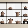Brown Ceramic Tea Sets Displayed On White And Black Grid Shelf With Various Teapots 3d model