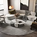 Modern Gray Sofa And Marble Coffee Table With Round Rug And Accent Pillows