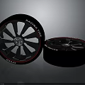 Car Sport Racing Tyres With Black Alloy Rims And Red Accent Stripes