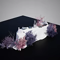Elegant Floral Display Setup With White Tablecloth And Purple Pink Plants