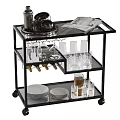 Stylish Black Serving Cart With Glass Shelves Plates Glasses And Magazine