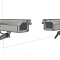 Dual Projection Monitoring Devices With Silver Casing Black Cables And Red Indicator Lights