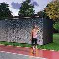 Decorative Perforated Fence With Green Lawn Trees And Red Track As Woman Stands Observing