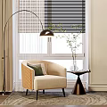 Beige Armchair With Green Cushion Floor Lamp Window Blinds And Side Table With Vase Plant