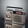 Vintage Cassette Radio With Silver Body Black Handle Control Panel And Display Screen