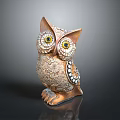 Decorative Owl Sculpture With Detailed Eyes And Textured Feather Art Design