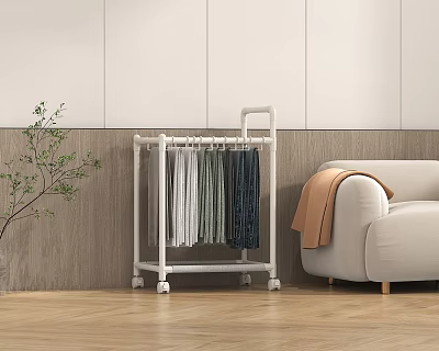 White clothes rack on wheels with hanging clothes near beige sofa in living room 3d model