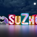 Colorful 3D Neon Letters I Love Suzhou Against Night Sky With Moon