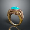 Elegant Vintage Gold Ring Featuring Blue Gemstone And Intricate Carved Patterns