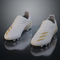 White Gold Soccer Cleats with Gold Stripes Upper and Spiked Soles on Black Reflective Background