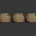 Three Handmade Clay Pots With White Black And Yellow Contents For Home Use