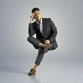 Stylish Man In Black Suit And White Shirt Sitting With Crossed Legs On Gray Background