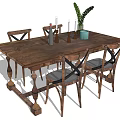 Rustic Wooden Dining Table Set with Cross Back Chairs and Green Plant Decor