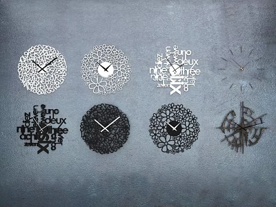 Various Modern Wall Clocks With Intricate Patterns And Text Designs 3d model