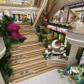 Stylish Modern Shopping Mall Hall With Cute Plush Dolls Lush Greenery And Warm Ambient Lights