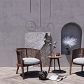 Rattan Chairs And Small Coffee Table In Minimalist Room With Grey Wall And Wooden Floor