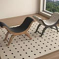 Modern Sofa Stools In Black And Patterned Design On Checkered Rug With Wooden Floor