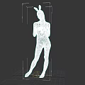 Woman Posing in White Lingerie with Bunny Ears Headband and Tattoo